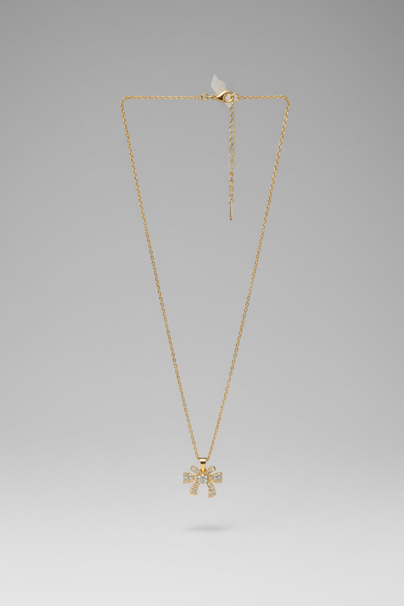 Collar Dije Lazo Dorado – Elegancia en un Solo Detalle